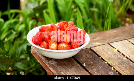 Strawberries displayed on a plate Stock Photo