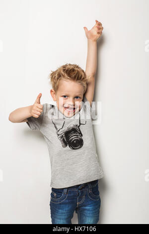 Portrait of emotionally kid. Studio portrait over white background Stock Photo