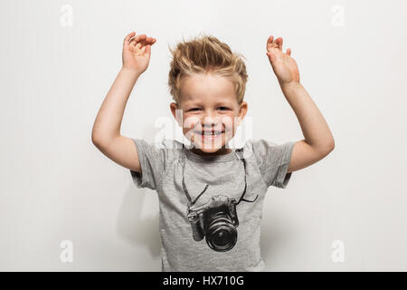 Portrait of happy joyful beautiful little boy. Studio portrait over white background Stock Photo