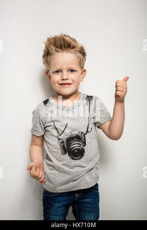 Portrait of happy joyful beautiful little boy. Studio portrait over white background Stock Photo
