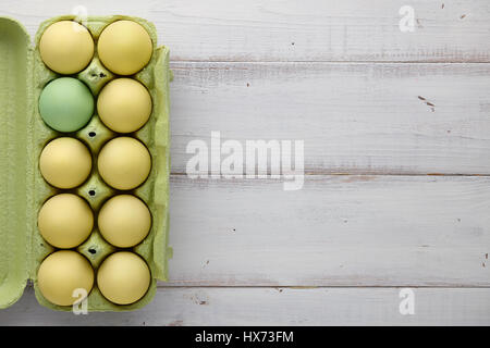 Carton package with colorful easter eggs Stock Photo