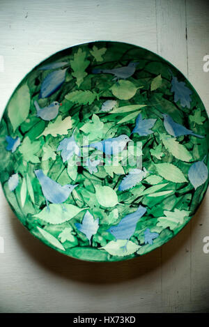 hand painted bowl, decorated with blue birds and leaves Stock Photo