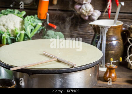 Homemade baking pancakes in the countryside on old wooden table Stock Photo