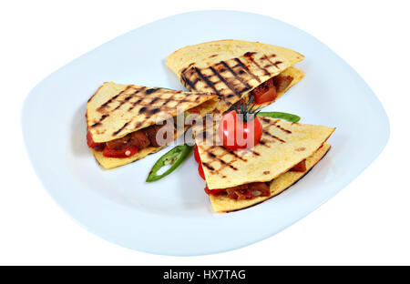 Chicken of Mexico, three fold-over tortillas Quesadilla on an oval serving platter isolated on white background. Stock Photo