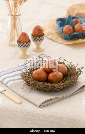 Traditionally dyed Easter eggs using onion skins, flowers and plants Stock Photo