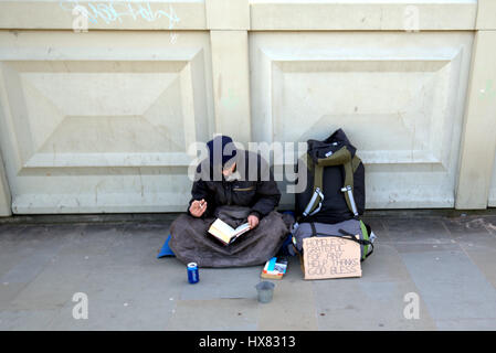 homeless in the uk begging on the street Stock Photo