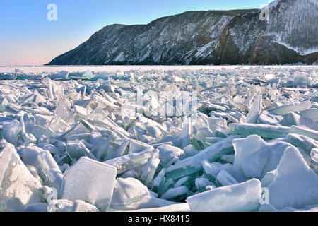 Pile of large fragments of ice. Hummocks occurred as a result of destruction of ice by wind at freeze-up. Lake Baikal. Irkutsk region. Russia Stock Photo
