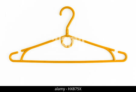 One colored plastic hanger, isolated on white background, close-up. Stock Photo