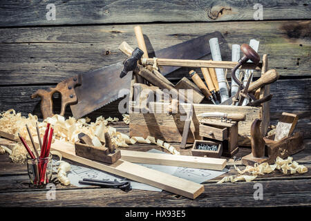 Vintage carpenter working tools on old wooden table Stock Photo