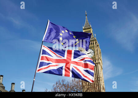 London, UK. 25th March 2017. Unite for Europe organised a Pro-EU march in London. Anti-BREXIT demonstrators march from Park Lane to Parliament Square. BREXIT flag, flags, Union Jack flag, EU flag, European flag, Big Ben. Parliament flags. UK politics UK. Brexit concept. British democracy. Vote Brexit. uk parliament brexit deal. Trade talks. Stock Photo