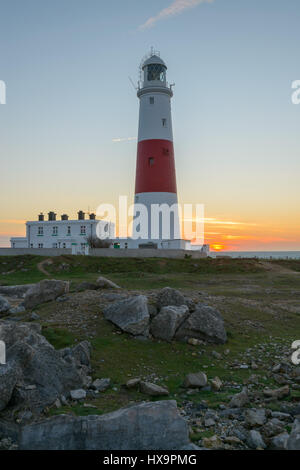 Portland Bill, Dorset, UK. 26th March 2017. A crisp colourful windy sunrise from Portland Bill on Mothering Sunday and the first day of BST.  © Dan Tucker/Alamy Live News Stock Photo