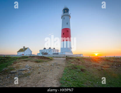 Portland Bill, Dorset, UK. 26th March 2017. A crisp colourful windy sunrise from Portland Bill on Mothering Sunday and the first day of BST.  © Dan Tucker/Alamy Live News Stock Photo