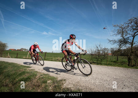 Ploegsteert, Belgium. 26th March, 2017. Belgium's Greg Van Avermaet (BMC) rides the new 'Plugstreet' sector of Gent-Wevelgem one day cycling race. Credit Simon Gill/Alamy Live News Stock Photo