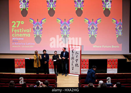 Milan. 27th Mar, 2017. Chinese writer Liu Zhenyun (2nd L) gives a speech before the screening of the Chinese movie 'I Am Not Madame Bovary', adapted from his literature work, during the 27th Festival of African, Asian and Latin American Cinema in Milan on Sunday. From March 17 to April 4, such events are held in the Netherlands, the Czech Republic, Austria, Italy, France and Germany, presenting Chinese stories and culture to European readers. Credit: Jin Yu/Xinhua/Alamy Live News Stock Photo