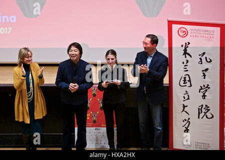 Milan. 27th Mar, 2017. Chinese writer Liu Zhenyun (2nd L) gives a speech before the screening of the Chinese movie 'I Am Not Madame Bovary', adpated from his original literature work, during the 27th Festival of African, Asian and Latin American Cinema in Milan on Sunday. From March 17 to April 4, such events are held in the Netherlands, the Czech Republic, Austria, Italy, France and Germany, presenting Chinese stories and culture to European readers. Credit: Jin Yu/Xinhua/Alamy Live News Stock Photo