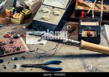 Electronics components in laboratory on old wooden table Stock Photo