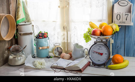 Ingredients for homemade donuts on old white table Stock Photo