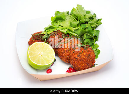 Middle eastern food -  vegetarian food with falafel, lime and coriander, UK - Concept - healthy eating Stock Photo