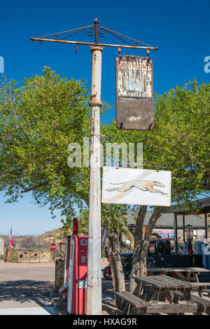 Greyhound bus signs at Hackberry, Arizona general store is a roadside attraction along historic route 66. Stock Photo