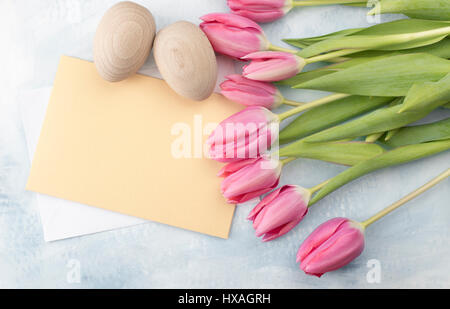 Easter eggs with tulips Stock Photo