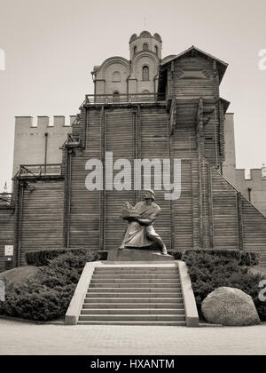 Kyiv, Ukraine - March 25, 2017: Golden gate and Monument of Prince Jaroslav in Kyiv, Ukraine. Black and white photography. Sepia toned. Stock Photo