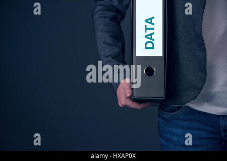 Backup business data concept, archive and keep safe. Businesswoman with document ring binder. Stock Photo