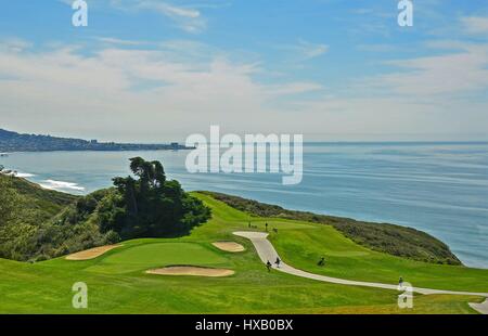 Golf Course with ocean in background Stock Photo