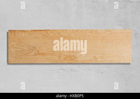 Rectangular wood sign on a rough wall Stock Photo