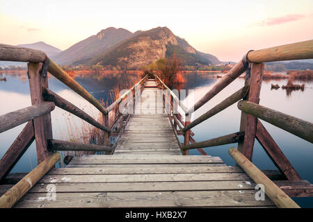 Wilderness Wonderful wooden bridge at Area Torbiere del Sebino, Lombardy, Italy Stock Photo