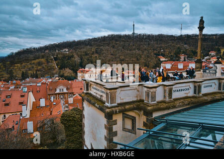 Open air Starbucks Coffee at Prague Castle with a breathtaking overlook over the city - PRAGUE / CZECH REPUBLIC - MARCH 20, 2017 Stock Photo