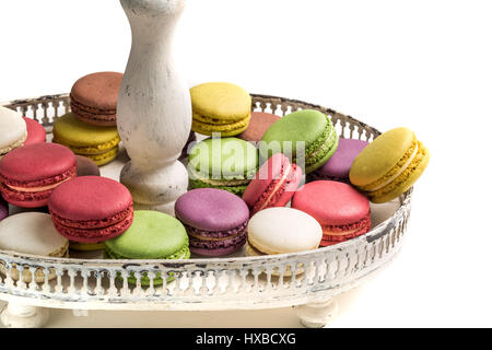 Stack of macaroons na plate on white background Stock Photo