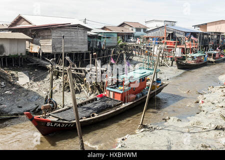 Fishing boats on the river in Sekinchan, Malaysia Stock Photo