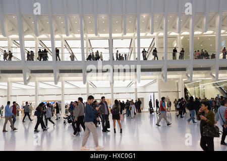 NEW YORK CITY - 1 OCTOBER 2016:  People walking on the ground and first floor of the Oculus by architect Santiago Calatrava, the modern train station 