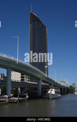 Brisbane, Australia: 1 William Street, the building housing much of the Queensland state government towers over the Brisbane River. Stock Photo