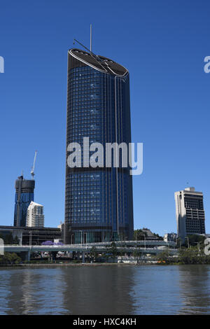 Brisbane, Australia: 1 William Street, the building housing much of the Queensland state government towers over the Brisbane River. Stock Photo