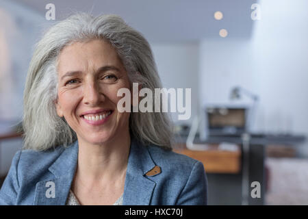 Portrait smiling, confident mature woman Stock Photo