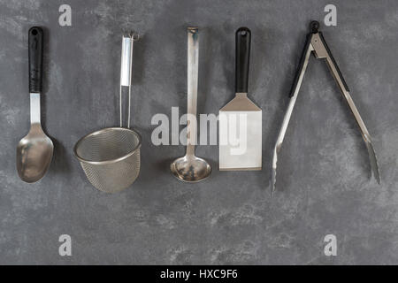 Top viez of Professional kitchen utensils on slqte background Stock Photo