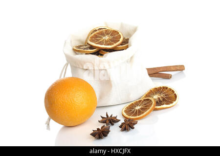 Orange with cinnamon sticks and star aniseed, Orange mit Zimtstangen und Sternanis Stock Photo