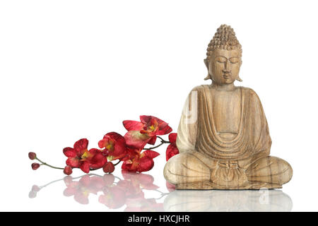 Buddha's statue and orchid, Buddhastatue und Orchidee Stock Photo