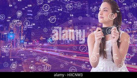 Digital composite of Woman with phone against Night city with connectors Stock Photo