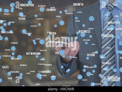 Digital composite of Businessman holding phone against Night city with connectors Stock Photo
