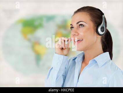 Digital composite of Travel agent with headset against blurry map Stock Photo