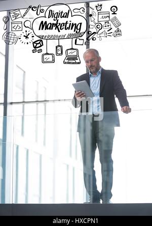 Digital composite of Business man on balcony with black business doodles Stock Photo