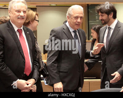 Brussels, Belgium. 27th Mar, 2017. Dimitris Avramopoulos (center) EU Commissioner for the Migration and Home Affairs. Credit: Leo Cavallo/Alamy Live News Stock Photo