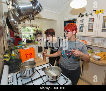 Sydney, Australia. 15th Mar, 2017. Hostess Miri Furlong (R) teaches University of Sydney master's student Jony Sun some cooking skills in Sydney, Australia, on March 15, 2017. International trade deals, bilateral agreements and strategic business partnerships are often considered the most important aspects of international relations. But the richest foundation for cross-cultural communication between China and Australia lies with the 90,000 Chinese students studying in Australia and living among Aussie families. Credit: Zhu Hongye/Xinhua/Alamy Live News Stock Photo