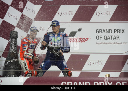 Losail International Circuit, Qatar. 26th Mar, 2017. Maverick Vinales, and Andrea Dovizioso on the podium after the Grand Prix of Qatar. Credit: Tom Morgan/Alamy Live News Stock Photo