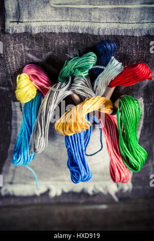 Colored threads in the mat tailor Stock Photo