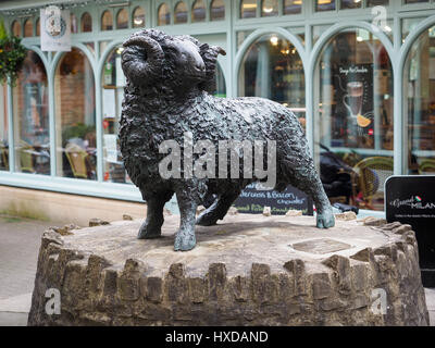 a view of Jill Tweed's black ram statue sculpture in the Woolmarket Wool Market in the center centre of Cirencester Stock Photo