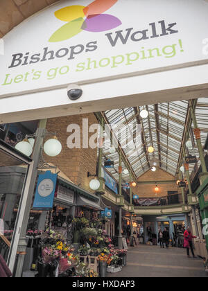 a  view of the entrance and exit to Bishops Walk shopping centre center showing the glass roof in Cirencester Stock Photo