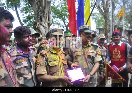 Holi between border guards of India and Bangladesh  -  12/03/2017  -  India / Tripura / Agartala  -  BSF (Border Security Force of India) and BGB (Border Guard Bangladesh) is playing holi and exchanging sweetes  in international border, Indo-Bangla border in Agartala, capital of the Northeastern state of Tripura.                                                                      Holi is a Hindu spring festival in India and Nepal, also known as the 'festival of colours' or the 'festival of love'. The festival signifies the victory of good over evil,   -  Abhisek Saha / Le Pictorium Stock Photo